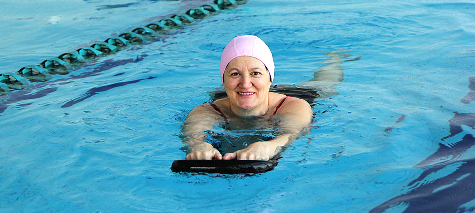 Middle Aged Woman in a swimming Pool; Shutterstock ID 619724444; PO: 123