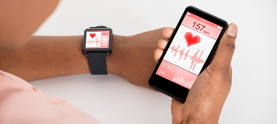 Close-up Of Hand With Mobile And Smartwatch Showing Heartbeat Rate; Shutterstock ID 360047438; PO: 123